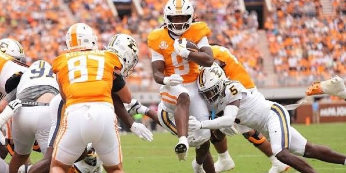 Tennessee Soccer Quarterback Invest Derrick Baker Leaves a Concept toward David Gabriel-Georges